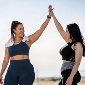 two girls giving each other a high five